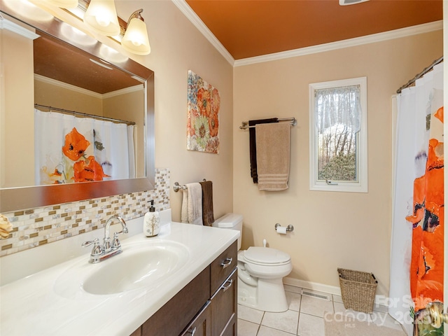 bathroom with toilet, crown molding, vanity, tile patterned flooring, and backsplash