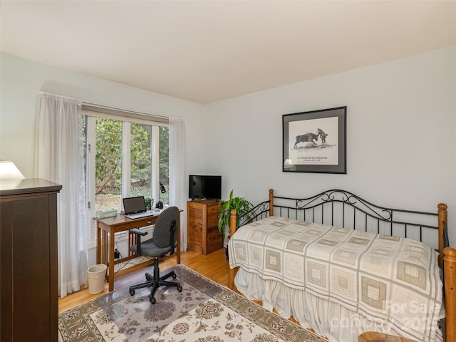 bedroom featuring hardwood / wood-style flooring