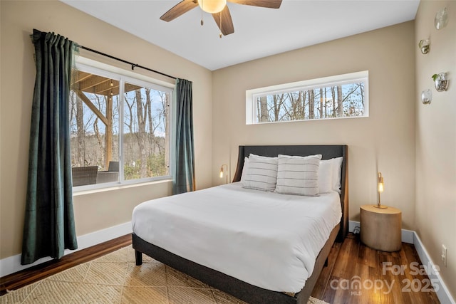 bedroom featuring wood-type flooring and ceiling fan