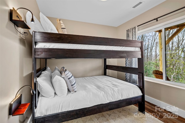 bedroom featuring hardwood / wood-style floors