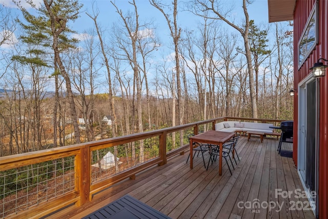 186 S Slope Ln, Old Fort, NC 28762 - wooden deck with a wooded view and outdoor lounge area