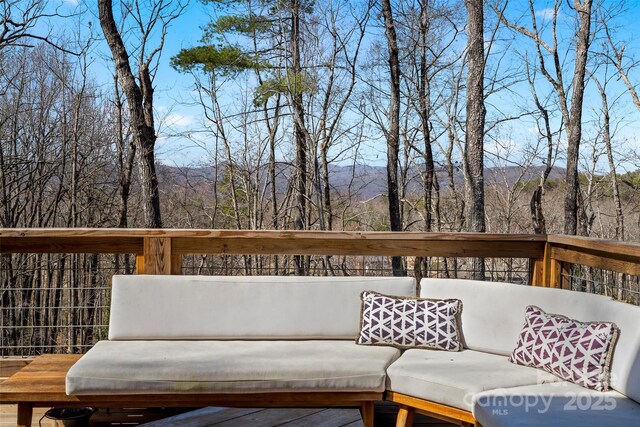 186 S Slope Ln, Old Fort, NC 28762 - deck featuring an outdoor living space and a view of trees