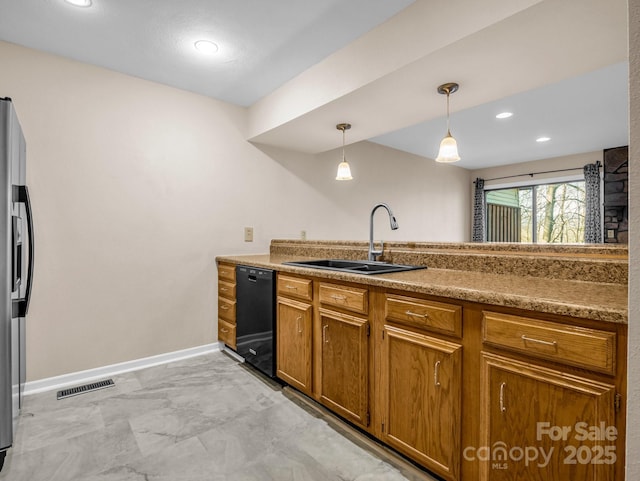 kitchen with stainless steel refrigerator with ice dispenser, dishwasher, sink, and pendant lighting