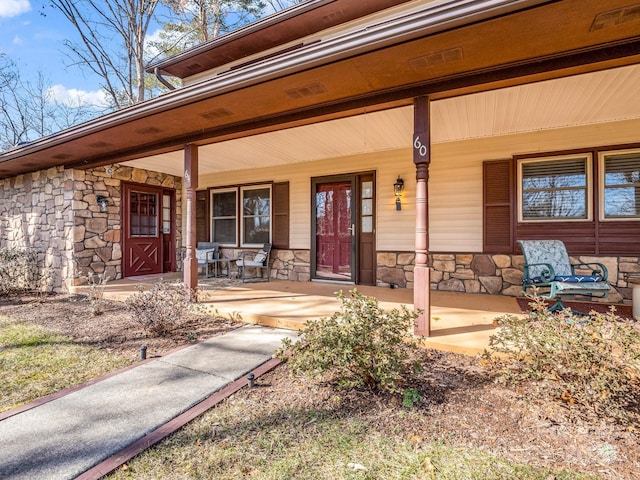 60 Vista View Ct, Etowah, NC 28729 - property entrance with a porch and stone siding