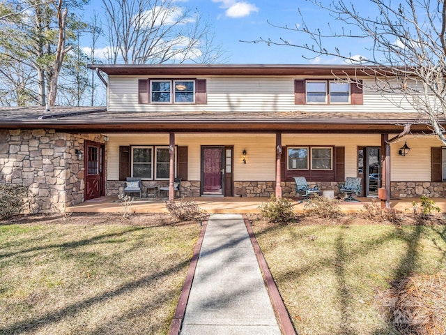 60 Vista View Ct, Etowah, NC 28729 - view of front of house with covered porch, a front yard, and stone siding