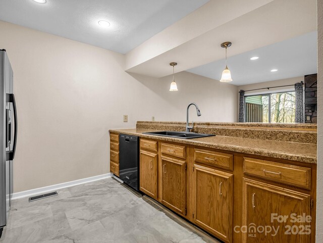 60 Vista View Ct, Etowah, NC 28729 - kitchen with brown cabinets, a sink, baseboards, stainless steel fridge with ice dispenser, and black dishwasher