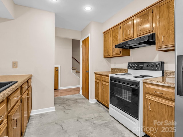 60 Vista View Ct, Etowah, NC 28729 - kitchen with baseboards, under cabinet range hood, brown cabinets, and white range with electric cooktop