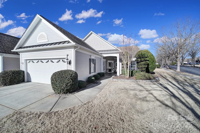 view of home's exterior with a garage