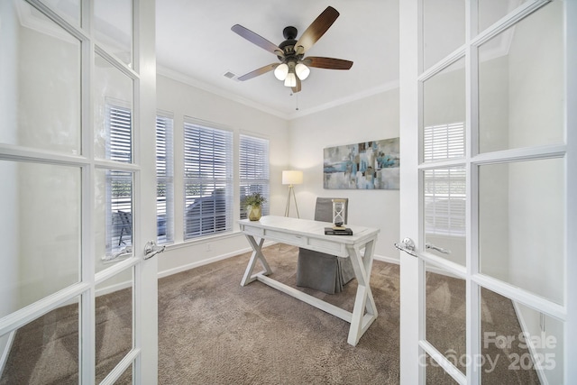 office with french doors, ceiling fan, crown molding, and carpet