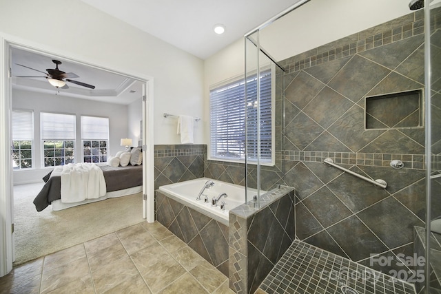 bathroom with tile patterned floors, shower with separate bathtub, and a healthy amount of sunlight