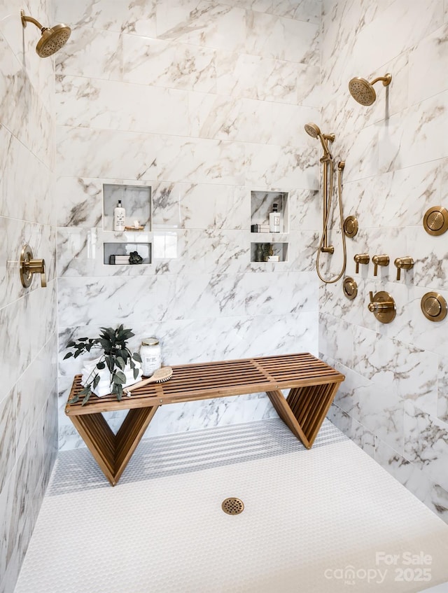 interior space featuring tiled shower