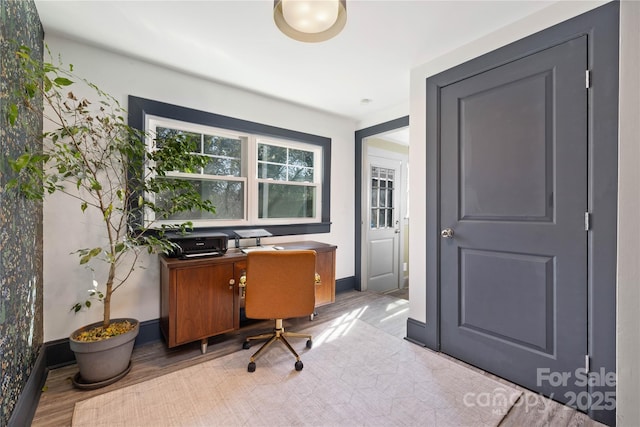 office area with light wood-type flooring