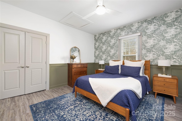 bedroom featuring hardwood / wood-style flooring and ceiling fan