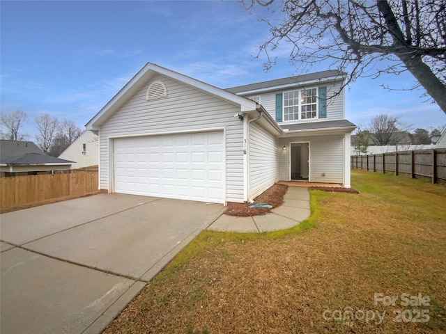 view of front of property with a garage and a front lawn