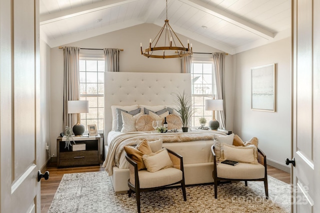 bedroom featuring a notable chandelier, light hardwood / wood-style flooring, and lofted ceiling with beams