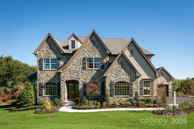 Lot11 Mayes Meadow Drive Devonshire, Cornelius, NC 28078 - view of front of house featuring stone siding, a front yard, stucco siding, and french doors