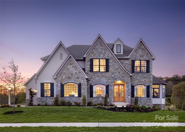 Lot11 Mayes Meadow Drive Devonshire, Cornelius, NC 28078 - view of front facade with stone siding, french doors, and a front lawn