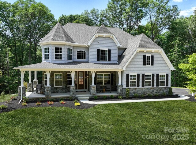 Lot11 Mayes Meadow Drive Devonshire, Cornelius, NC 28078 - view of front of house with stone siding, a shingled roof, a porch, and a front yard