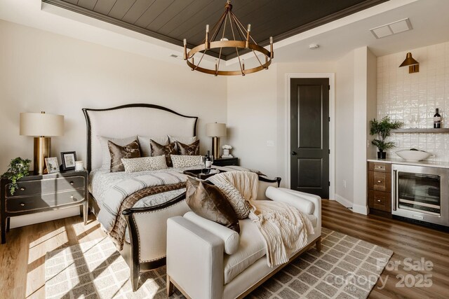 Lot11 Mayes Meadow Drive Devonshire, Cornelius, NC 28078 - bedroom featuring wine cooler, a chandelier, wood finished floors, and wood ceiling