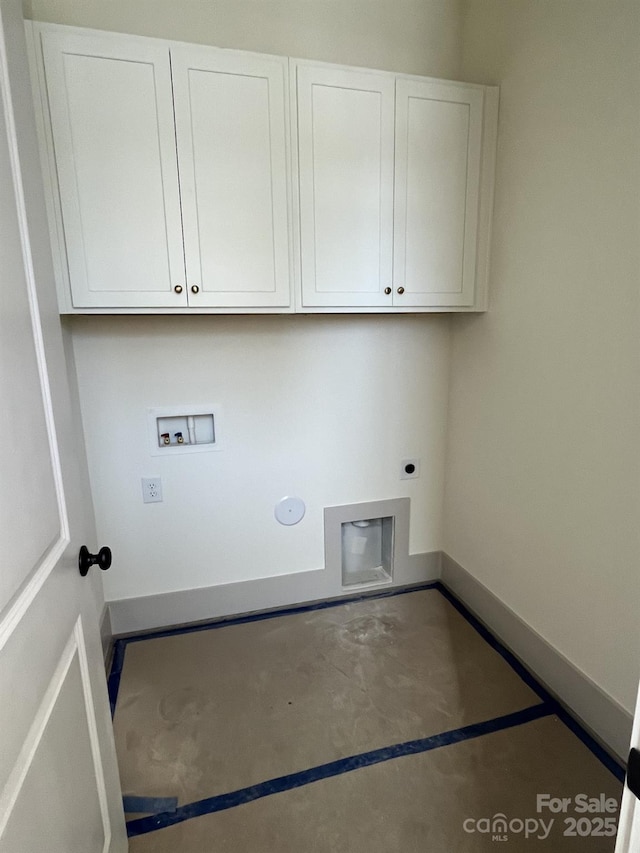 clothes washing area with gas dryer hookup, cabinets, washer hookup, and electric dryer hookup