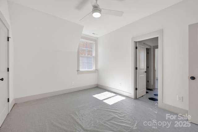 unfurnished bedroom featuring baseboards and a ceiling fan