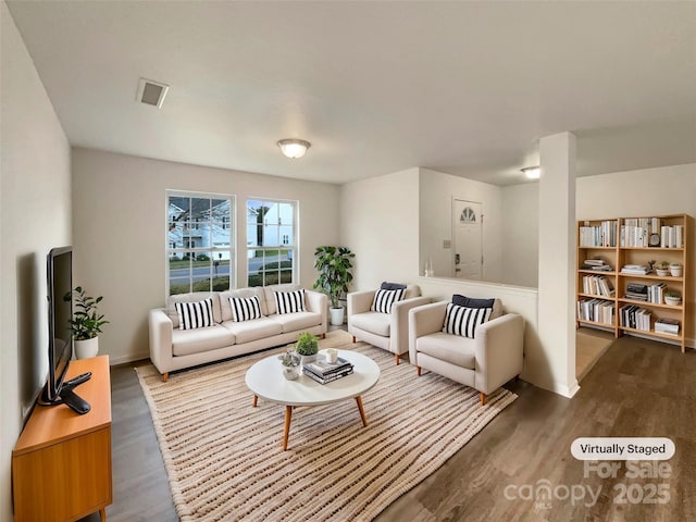 living room featuring wood-type flooring