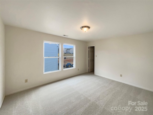 view of carpeted spare room