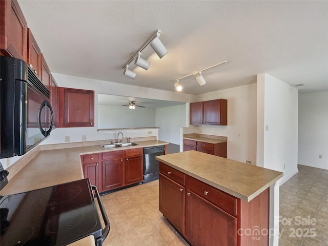 3418 Pikes Peak Dr, Gastonia, NC 28052 - kitchen with black appliances, a sink, a ceiling fan, light countertops, and dark brown cabinets