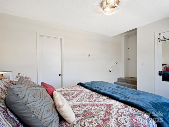 bedroom with a textured ceiling