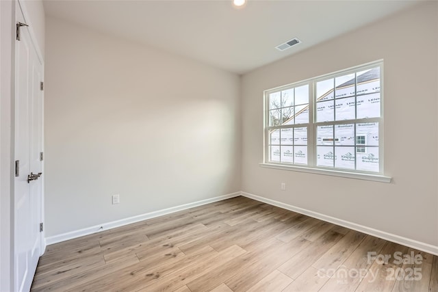 empty room featuring light hardwood / wood-style flooring