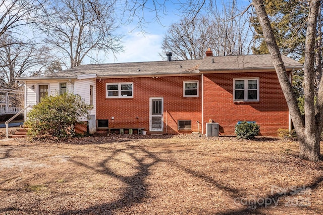 back of property with central air condition unit