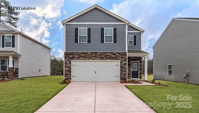 view of front facade with a garage and a front lawn