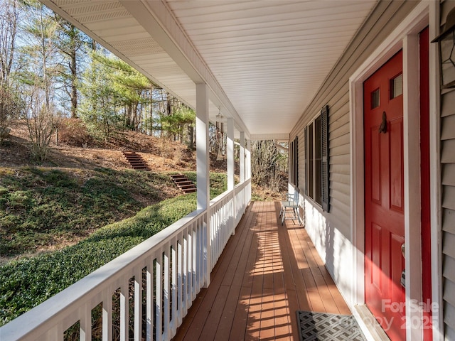 wooden terrace featuring a porch