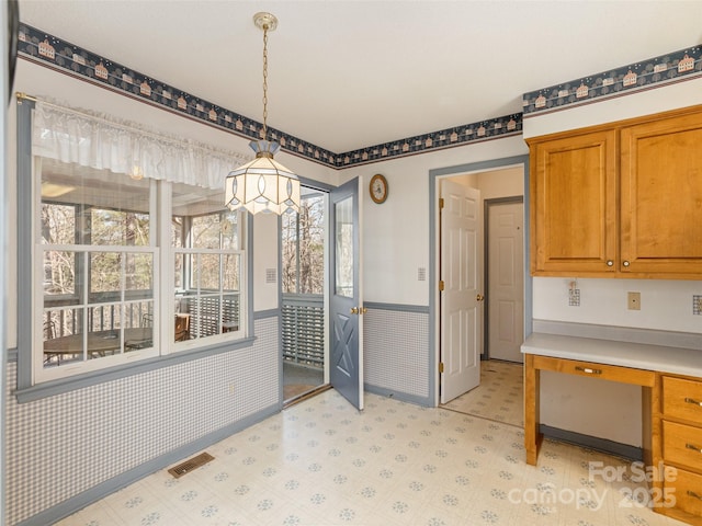 dining room with built in desk