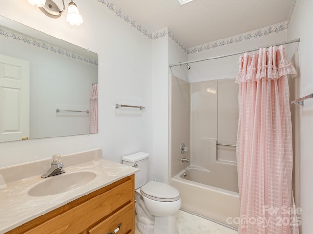 full bathroom featuring vanity, toilet, and shower / tub combo