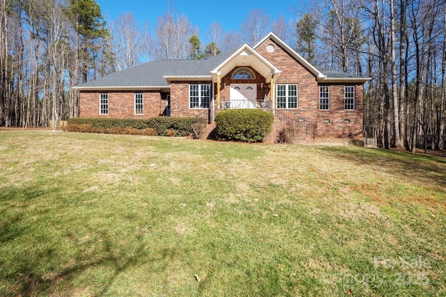 ranch-style home with a front yard