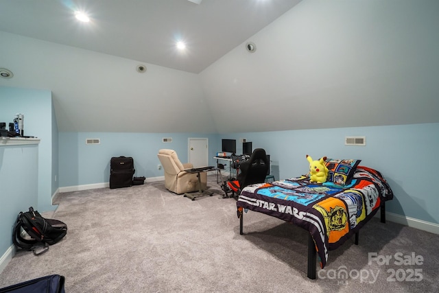 bedroom featuring lofted ceiling and carpet flooring