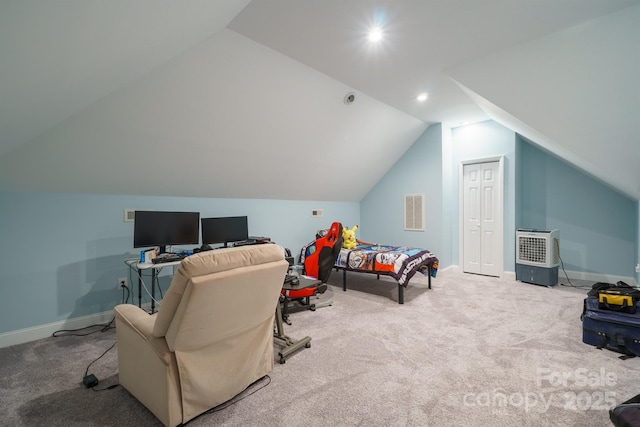 bedroom featuring lofted ceiling and carpet flooring