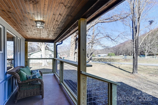 balcony featuring a mountain view