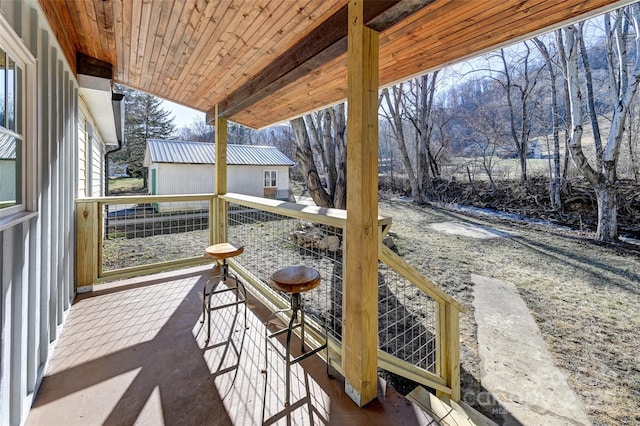 view of patio featuring an outdoor structure