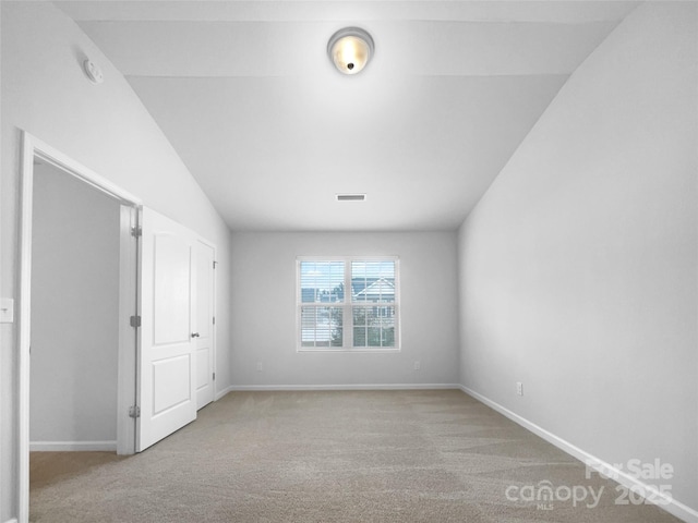 interior space featuring light colored carpet