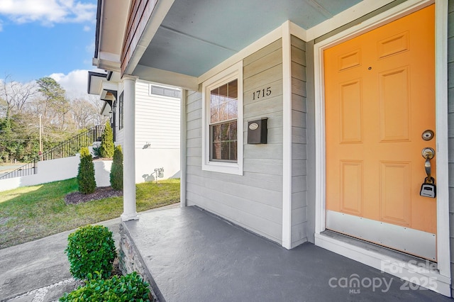 entrance to property with covered porch