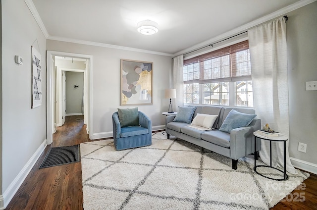 living room with hardwood / wood-style flooring and crown molding