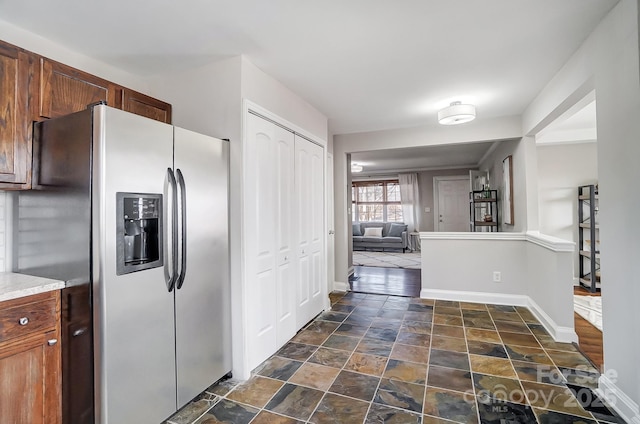 kitchen with stainless steel refrigerator with ice dispenser