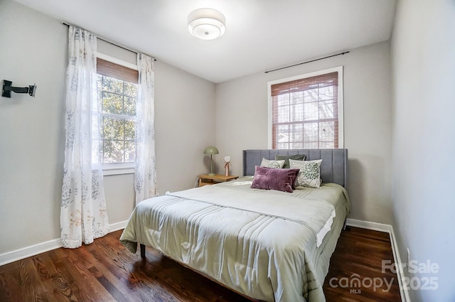 bedroom featuring dark hardwood / wood-style floors