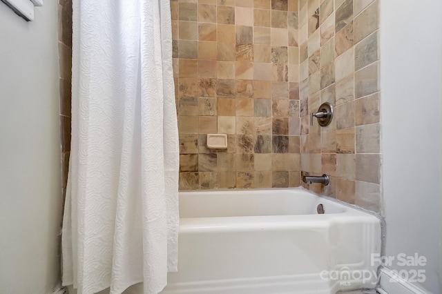 bathroom featuring shower / tub combo with curtain