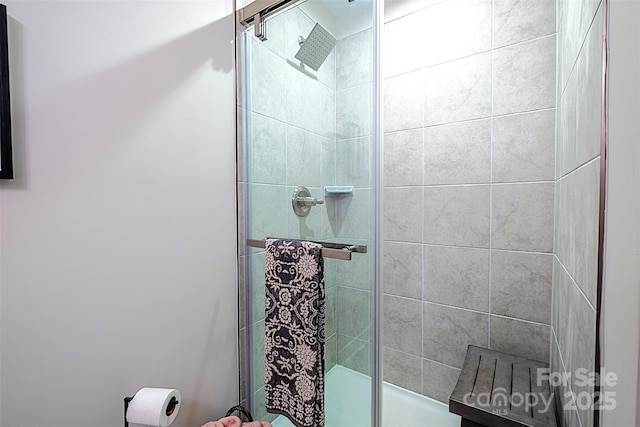 bathroom with an enclosed shower