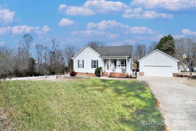 ranch-style home featuring a garage, covered porch, and a front lawn