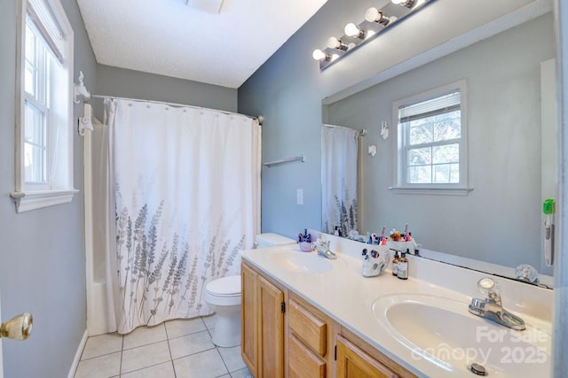 full bathroom with tile patterned floors, toilet, vanity, and shower / bath combo