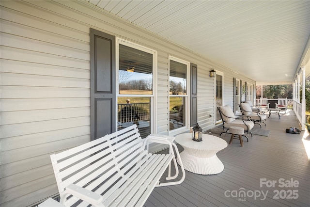 deck featuring covered porch